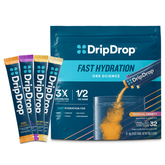 dripdrop-tropical-variety-pack-electrolyte-powder-8-oz-sticks-32-count-l7 Tropical_Variety_-_32ct_-_Transparent.png